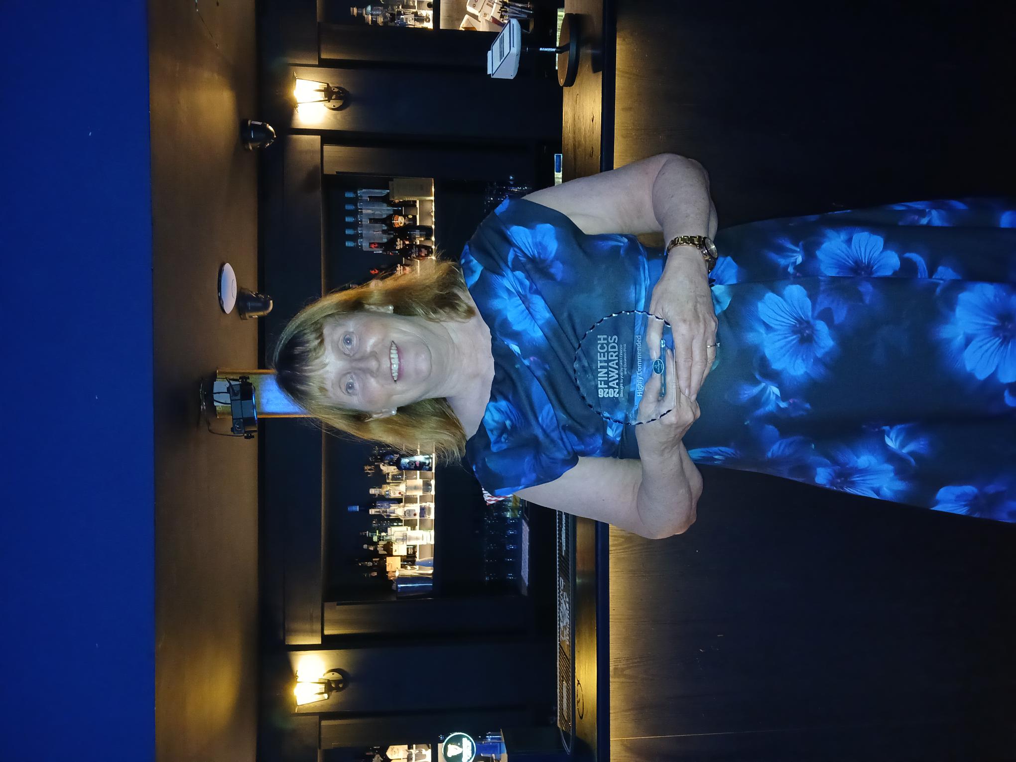 AllSkills CEO Deirdre holding the Highly Commended Award